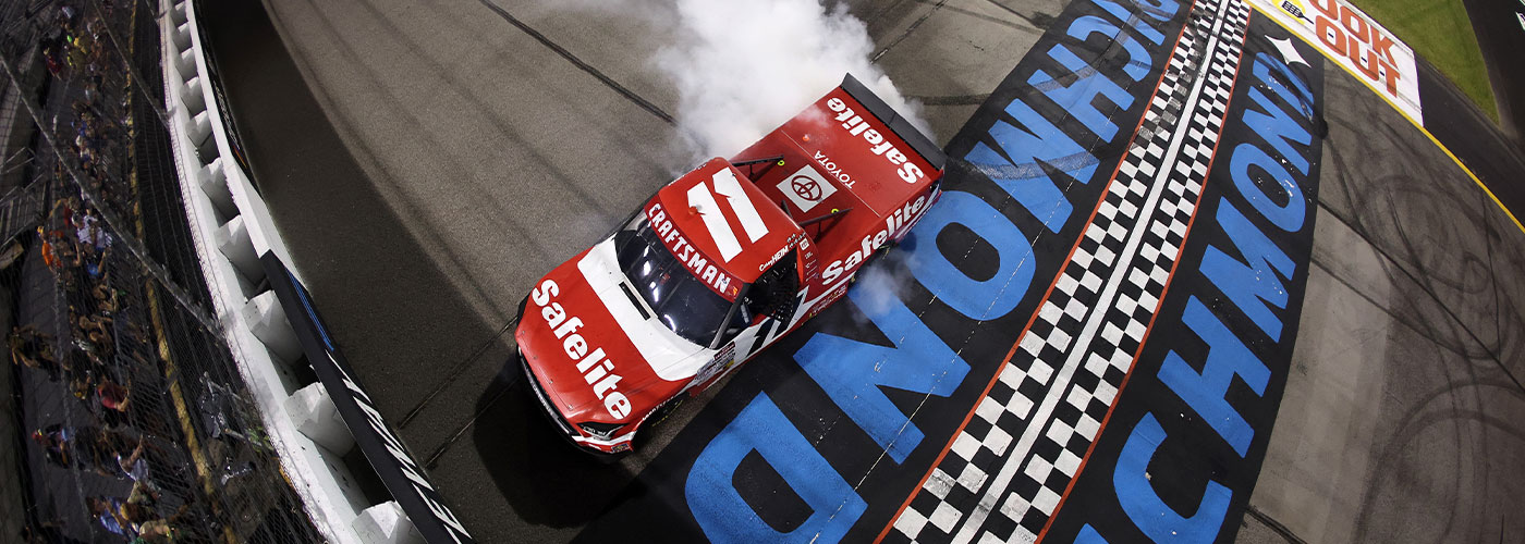 Corey Heim, driver of the #11 Safelite Toyota, celebrates with a burnout after winning the NASCAR Craftsman Truck Series eero 250 at Richmond Raceway on August 15, 2025 in Richmond, Virginia.